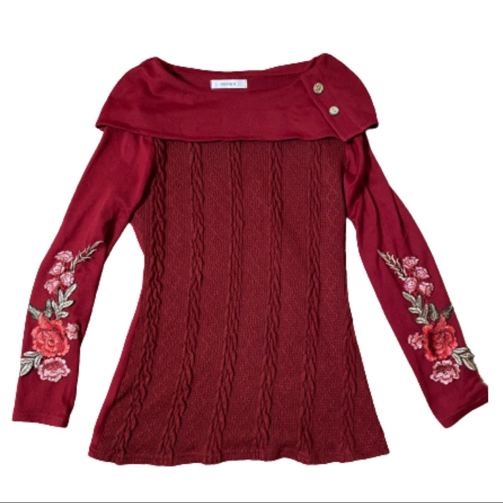 Dressfo Size 4 burgundy sweater with flowery details on the sleeves.